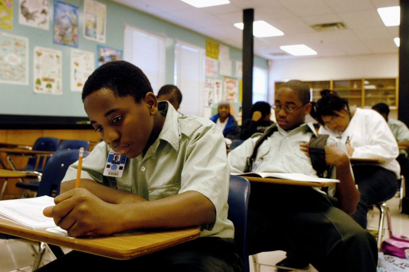 Freshman Donald Wiggins takes a final exam at the Forestville Military Academy January 21, 2004 in Forestville, Maryland. Most of the students at Forestville are from low-income families and rely on the 