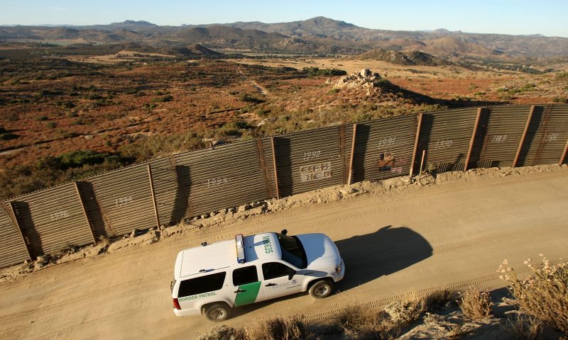 : US Border Patrol agents carry out special operations near the US-Mexico border fence following the first fatal shooting of a US Border Patrol agent in more than a decade on July 30, 2009 near the rural town of Campo, some 60 miles east of San Diego, California. 30-year-old agent Robert Rosas was killed on July 23 when he tracked a suspicious group of people alone in remote brushy hills north of the border in this region. Violence has been escalating in Mexico with fights between well-armed drug cartels and the army becoming common since Mexican President Felipe Calderon began his army-backed war on the cartels. Since the conflict began in late 2006, 12,800 people have been killed. Mexican officials charge that guns which are easily smuggled in from the US have flooded into Mexico where gun laws are strict. (Photo by David McNew/Getty Images)