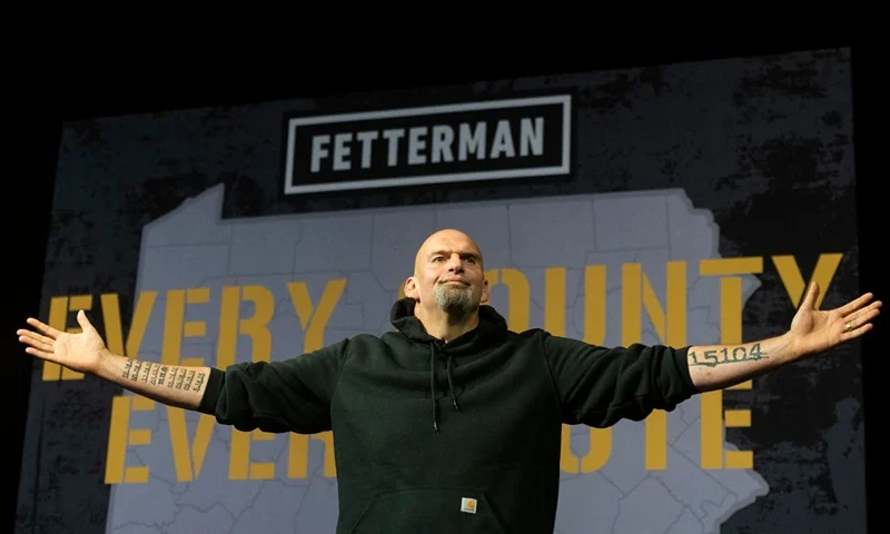 ERIE, PA - AUGUST 12: Democratic Senate candidate Lt. Gov. John Fetterman (D-PA) is welcomed on stage during a rally at the Bayfront Convention Center on August 12, 2022 in Erie, Pennsylvania. Fetterman made his return to the campaign trail in Erie after recovering from a stroke he suffered in May. (Photo by Nate Smallwood/Getty Images)
