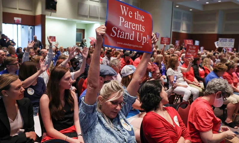 Parents and community members attend a Loudoun County School Board meeting on June 22, 2021. (REUTERS/Evelyn Hockstein)