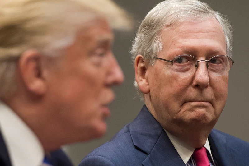 US President Donald Trump speaks alongside Senate Majority Leader Mitch McConnell (R), as they hold a meeting about tax reform in the Roosevelt Room of the White House in Washington, DC, September 5, 2017. / AFP PHOTO / SAUL LOEB        (Photo credit should read SAUL LOEB/AFP via Getty Images)