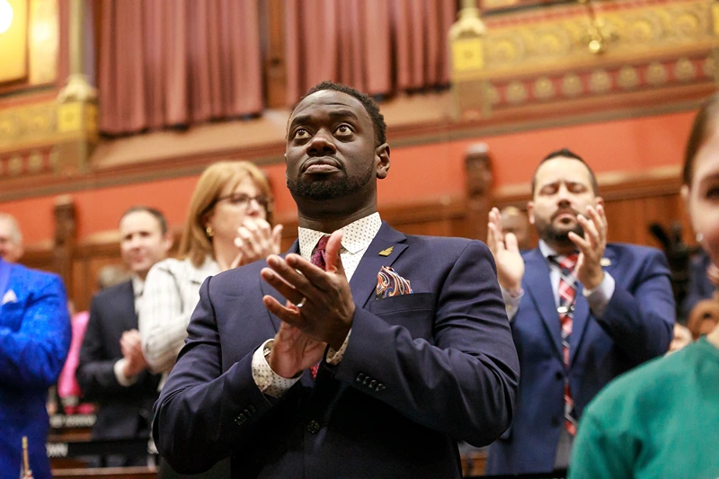 State Rep. Quentin Williams, D-Middletown, applauds during Connecticut Gov. Ned Lamont's state of the state address, Wednesday, Jan. 4, 2023, in Hartford, Conn. Williams was killed overnight in a wrong-way highway crash after having attended the governor's inaugural ball hours and after having been sworn in to a third term, House Democratic leaders said Thursday. (Brian O'Connor/Connecticut House Democrats via AP)