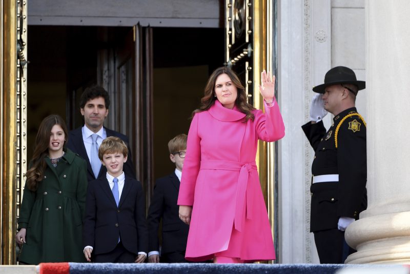 Arkansas Gov.-elect Sarah Huckabee Sanders is introduced with husband Bryan, and children Scarlett, George, and Huck prior to taking the oath of the office on the steps of the Arkansas Capitol Tuesday, Jan. 10, 2023, in Little Rock, Ark. (AP Photo/Will Newton)