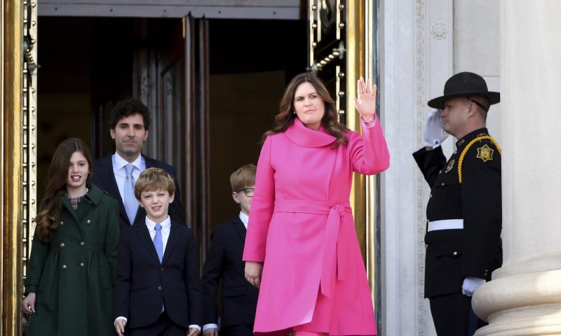 Arkansas Gov.-elect Sarah Huckabee Sanders is introduced with husband Bryan, and children Scarlett, George, and Huck prior to taking the oath of the office on the steps of the Arkansas Capitol Tuesday, Jan. 10, 2023, in Little Rock, Ark. (AP Photo/Will Newton)