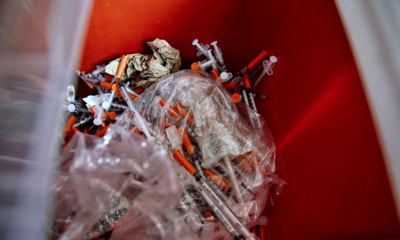 Used syringes, collected by the staff of the Family and Medical Counselling Service Inc (FMCS), sit in a container inside the FMCS van in Washington, DC, on April 21, 2022. - Several organizations are trying to fight the damages caused by fentanyl, an ultra-powerful and addictive synthetic opioid, in the US capital. In 2021, 95% of the city's fatal opioid overdoses were fentanyl-related, and 85% were Black people. (Photo by Agnes BUN / AFP) (Photo by AGNES BUN/AFP via Getty Images)