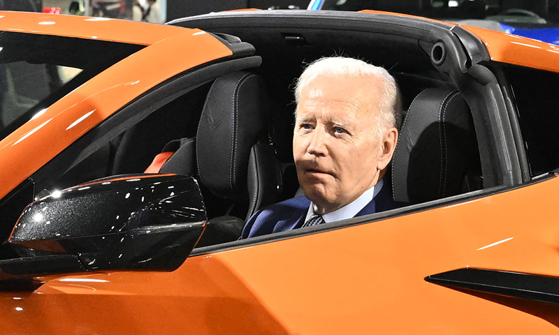 Biden is visiting the auto show to highlight electric vehicle manufacturing. (Photo by Mandel NGAN / AFP) (Photo by MANDEL NGAN/AFP via Getty Images)