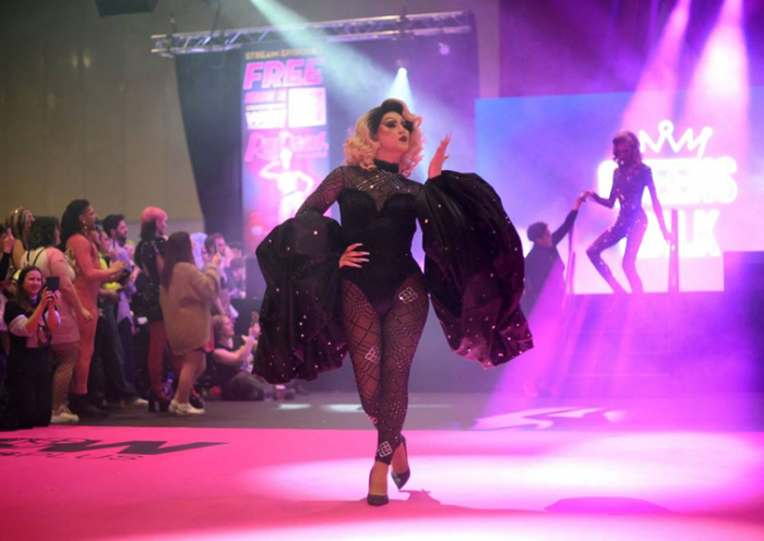 A drag queen performs on a catwalk during RuPaul's DragCon UK 2023 Drag Queen convention at the ExCeL centre in east London on January 6, 2023. (Photo by Daniel LEAL / AFP) (Photo by DANIEL LEAL/AFP via Getty Images)