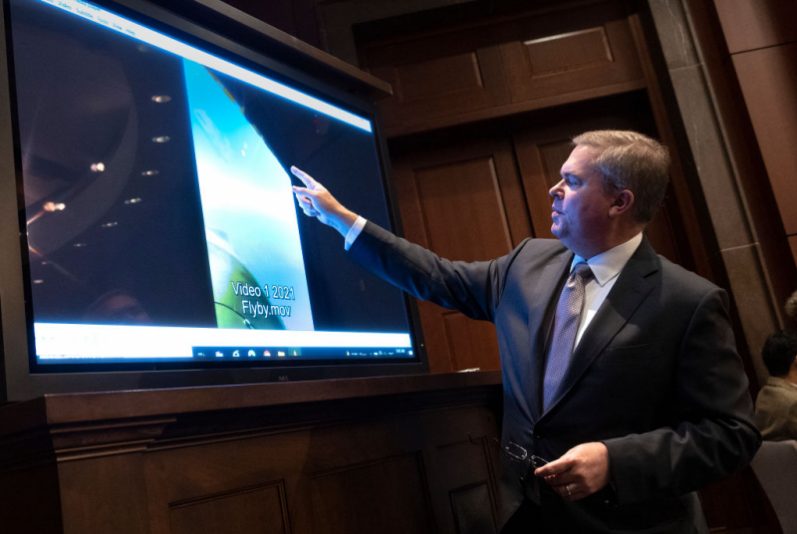 WASHINGTON, DC - MAY 17: U.S. Deputy Director of Naval Intelligence Scott Bray explains a video of an unidentified aerial phenomena, as he testifies before a House Intelligence Committee subcommittee hearing at the U.S. Capitol on May 17, 2022 in Washington, DC. The committee met to investigate Unidentified Aerial Phenomena, commonly referred to as Unidentified Flying Objects (UFOs). (Photo by Kevin Dietsch/Getty Images)
