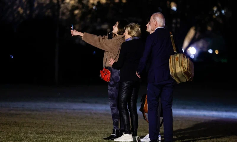 U.S. President Joe Biden and first lady Jill Biden take a picture with their grandchildren Natalie Biden and Robert Biden II before boarding Marine One on the South Lawn on December 27, 2022 in Washington, DC. The Bidens are spending the New Years holiday in St. Croix, United States Virgin Islands. (Photo by Anna Moneymaker/Getty Images)