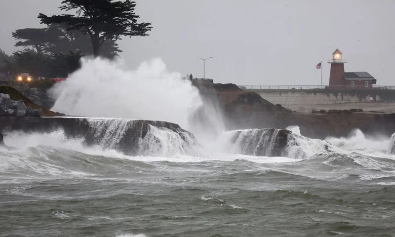 SANTA CRUZ, CALIFORNIA - JANUARY 11: Pacific Ocean waves break near Lighthouse Point on January 11, 2023 in Santa Cruz, California. The San Francisco Bay Area and much of Northern California continues to get drenched by powerful atmospheric river events that have brought high winds and flooding rains. The storms have toppled trees, flooded roads and cut power to tens of thousands. Storms are lined up over the Pacific Ocean and are expected to bring more rain and wind through the end of the week. (Photo by Mario Tama/Getty Images)