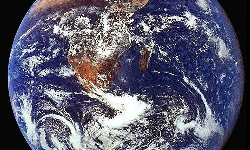 File Photo: The Crew Of Apollo 17 Took This Photograph Of Earth In December 1972 While The Spacecraft Was Traveling Between The Earth And The Moon. The Orange-Red Deserts Of Africa And Saudi Arabia Stand In Stark Contrast To The Deep Blue Of The Oceans And The White Of Both Clouds And Snow-Covered Antarctica. (Photo By Nasa/Getty Images)