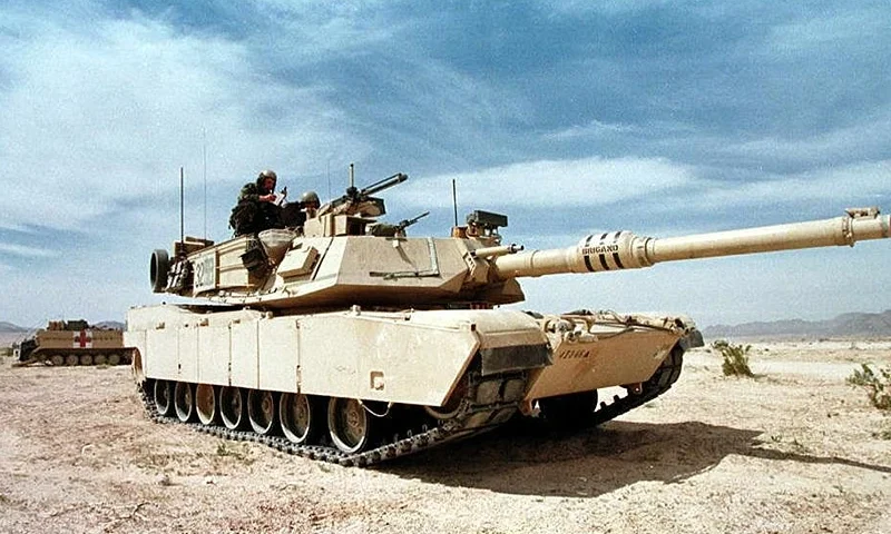 FORT IRWIN, UNITED STATES: An M-1A1 Abrams tank guards a position during the Advance Warfighting Experiment at the Fort Irwin Army National Training Center in Fort Irwin, CA, 16 March. The experiment lasts for 14 days and pits the digitalized 1st Brigade of the 4th Infantry, in which vehicles and aircraft are inter-linked to each other via computer screens, against an opposing conventional force. The digitalized Abrams tank contains electronic warfare equipment, such as Friend-or-Foe recognition, battlefield placement computers and global positioning. AFP PHOTO/Mike NELSON (Photo credit should read MIKE NELSON/AFP via Getty Images)