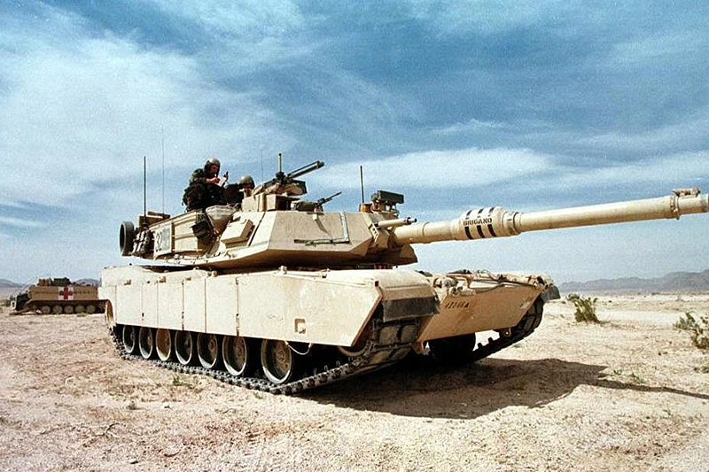 FORT IRWIN, UNITED STATES:  An M-1A1 Abrams tank guards a position during the Advance Warfighting Experiment at the Fort Irwin Army National Training Center in Fort Irwin, CA, 16 March. The experiment lasts for 14 days and pits the digitalized 1st Brigade of the 4th Infantry, in which vehicles and aircraft are inter-linked to each other via computer screens, against an opposing conventional force.  The digitalized Abrams tank contains electronic warfare equipment, such as Friend-or-Foe recognition, battlefield placement computers and global positioning.  AFP PHOTO/Mike NELSON (Photo credit should read MIKE NELSON/AFP via Getty Images)