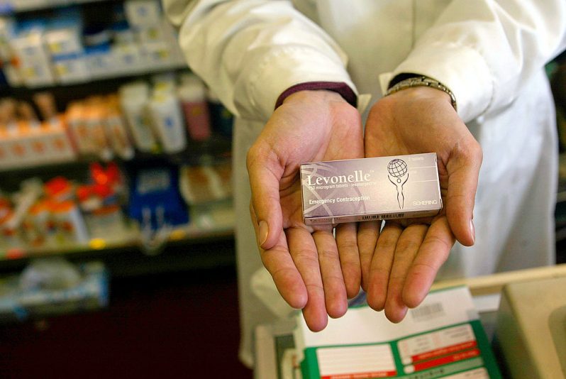 A pharmacist holds a pack of Levonelle March 23, 2002 at a drugstore in London. Levonelle is the U.K. brand name for Levonorgestrel, more commonly known as ''The Morning After Pill'', and is available across the counter in Britain, but only after a screening process by the pharmacist. (Photo by Sion Touhig/Getty Images)