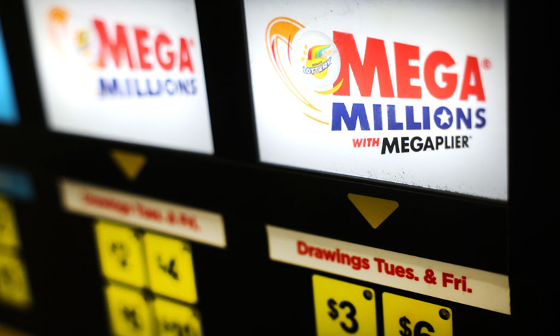 : A lottery ticket vending machine offers Mega Millions tickets for sale on January 09, 2023 in Chicago, Illinois. The estimated value of Tuesday's Mega Millions drawing is $1.1 Billion. (Photo by Scott Olson/Getty Images)