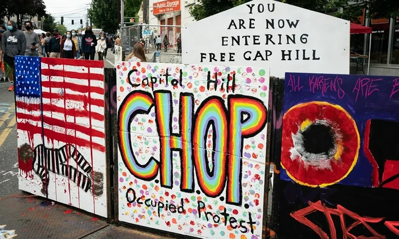 A signs reads "Capitol Hill Occupied Protest" in area that has been referred to by protesters by that name as well as "Capitol Hill Organized Protest, or CHOP, on June 14, 2020 in Seattle, Washington.(Photo by David Ryder/Getty Images)