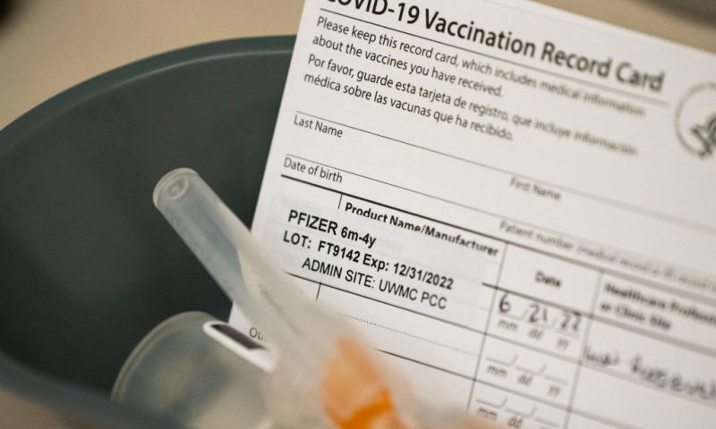 Doses of the Pfizer Covid-19 vaccine and vaccination record cards await pediatric patients at UW Medical Center - Roosevelt on June 21, 2022 in Seattle, Washington. Covid-19 vaccinations for children younger than 5 began today across the U.S. (Photo by David Ryder/Getty Images)Washington. Covid-19 vaccinations for children younger than 5 began today across the U.S. (Photo by David Ryder/Getty Images)
