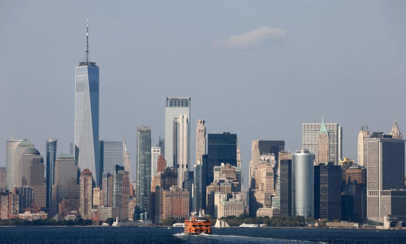 A ferry is seen in front of the Manhattan skyline in New York, September 18, 2022. (Photo by Ludovic MARIN / AFP) (Photo by LUDOVIC MARIN/AFP via Getty Images)