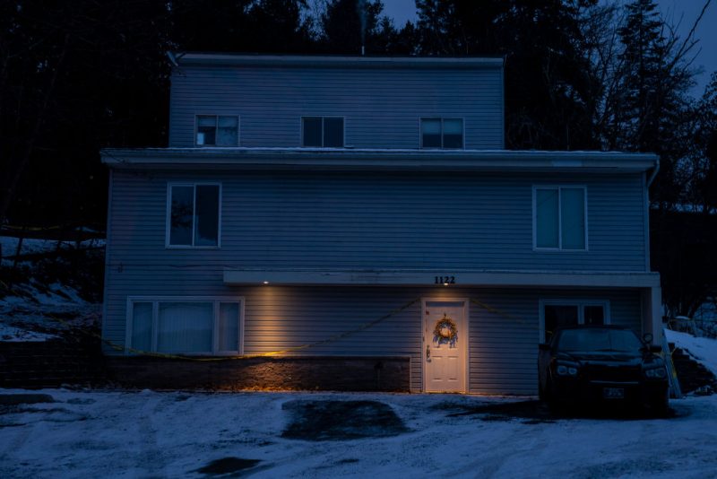 MOSCOW, ID - JANUARY 3: Lights illuminate police tape on a home where a quadruple murder took place on January 3, 2023 in Moscow, Idaho. A suspect has been arrested for the murders of the four University of Idaho students. (Photo by David Ryder/Getty Images)