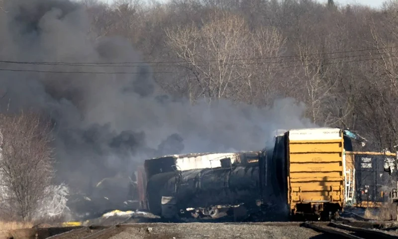 The train accident sparked a massive fire and evacuation orders, officials and reports said Saturday. No injuries or fatalities were reported after the 50-car train came off the tracks late February 3 near the Ohio-Pennsylvania state border. The train was shipping cargo from Madison, Illinois, to Conway, Pennsylvania, when it derailed in East Palestine, Ohio. (Photo by DUSTIN FRANZ / AFP) (Photo by DUSTIN FRANZ/AFP via Getty Images)