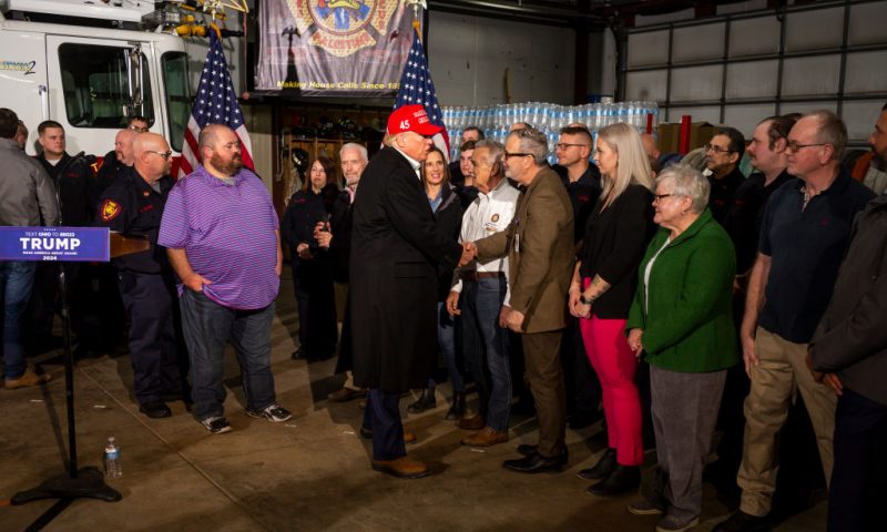 Former President Donald Trump shakes hands with residents of East Palestine after delivering remarks at the East Palestine Fire Department station on February 22, 2023 in East Palestine, Ohio. On February 3rd, a Norfolk Southern Railways train carrying toxic chemicals derailed causing an environmental disaster. Thousands of residents were ordered to evacuate after the area was placed under a state of emergency and temporary evacuation orders. (Photo by Michael Swensen/Getty Images)
