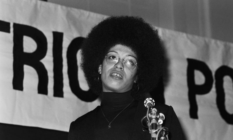 American political activist, Angela Davis, speaking at an anti-Apartheid rally at Friends House, Euston, London, 13th December 1974. Davis is in London to campaign for the release of political prisoners in South Africa. (Photo by Keystone/Hulton Archive/Getty Images)