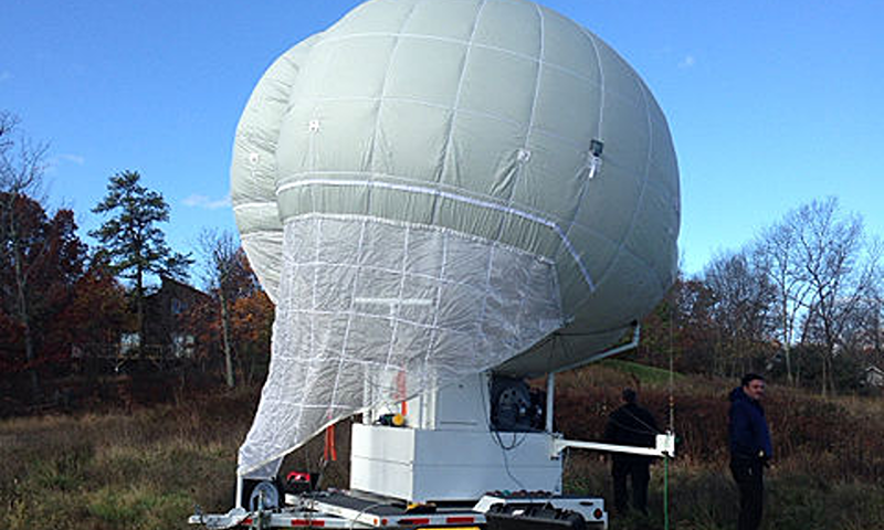 In this handout provided by the Pennsylvania State Police, a large Mylar surveillance balloon that is being used in the search for suspected killer Eric Frein is seen on its base station in Pennsylvania. (Photo by Pennsylvania State Police via Getty Images)