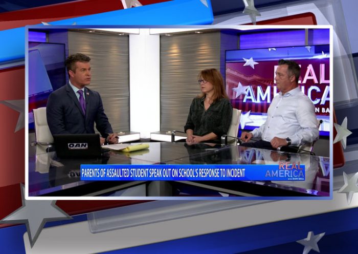 Video still from Amy Mullins and Norris Hill's interview with Real America on One America News Network
