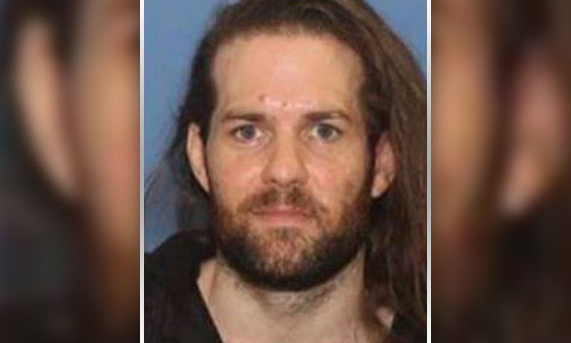 This undated photo provided by the Grants Pass Police Department shows Benjamin Obadiah Foster. Foster, accused of torturing a woman he held captive in Oregon, and who was convicted in Nevada of keeping another woman in captivity, is using dating apps to find people who can help him avoid the police or to find new victims, authorities said Friday, Jan. 27, 2023. (Grants Pass Police Department via AP)