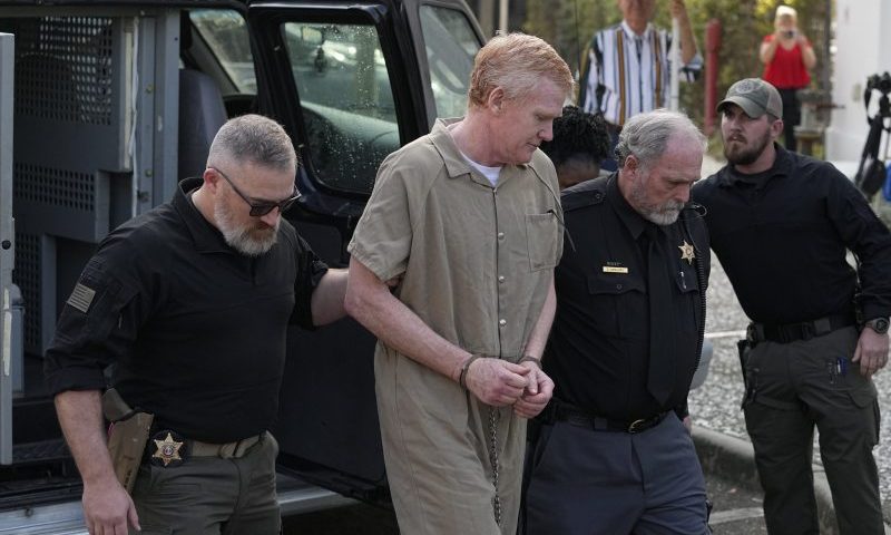 Alex Murdaugh is led to the Colleton County Courthouse by sheriff's deputies for sentencing Friday, March 3, 2023 in Walterboro, S.C., after being convicted of two counts of murder in the June 7, 2021, shooting deaths of Murdaugh's wife and son. (AP Photo/Chris Carlson)