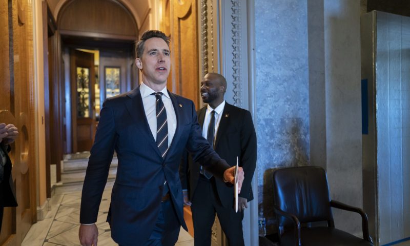 Sen. Josh Hawley, R-Mo., departs the chamber during the vote to confirm former Los Angeles Mayor Eric Garcetti as the next ambassador to India, more than a year and a half after he was initially selected for the post, at the Capitol in Washington, Wednesday, March 15, 2023. (AP Photo/J. Scott Applewhite)