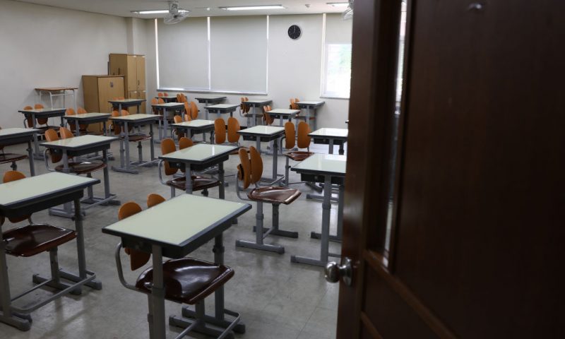 An empty classroom is seen ahead of school re-opening on May 11, 2020 in Seoul, South Korea. South Korea's education ministry announced plans to re-open schools starting from May 13, more than two months after schools were closed in a precautionary measure against the coronavirus. Coronavirus cases linked to clubs and bars in Seoul's multicultural district of Itaewon have jumped to 54, an official said Sunday, as South Korea struggles to stop the cluster infection from spreading further. According to the Korea Center for Disease Control and Prevention, 35 new cases were reported. The total number of infections in the nation tallies at 10,909. (Photo by Chung Sung-Jun/Getty Images)