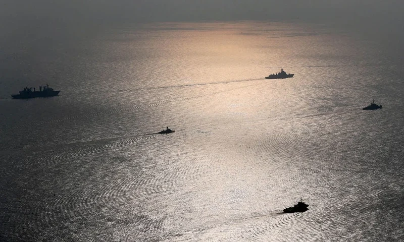 TOPSHOT - A handout picture made available by the Iranian Army official website on January, 21 2022 shows Iranian, Russia and Chinese warships during a joint military drill in the Indian ocean. - Iran, Russia and China will began today joint naval drills for three days in the Indian Ocean, seeking to reinforce "common security", an Iranian naval official said. (Photo by Iranian Army office / AFP) (Photo by -/Iranian Army office/AFP via Getty Images)