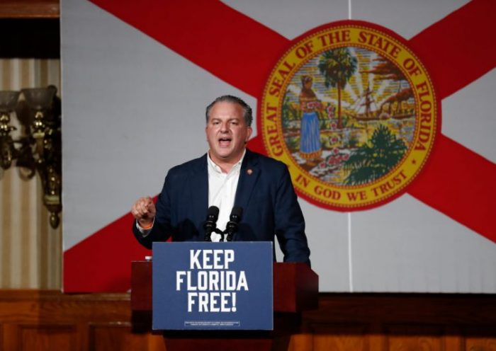 ORLANDO, FL - NOVEMBER 07: Florida Chief Financial Officer Jimmy Patronis speaks before introducing Florida Gov. Ron DeSantis during a rally for Florida Republicans at the Cheyenne Saloon on November 7, 2022 in Orlando, Florida. DeSantis faces former Democratic Gov. Charlie Crist in tomorrow's general election. (Photo by Octavio Jones/Getty Images)