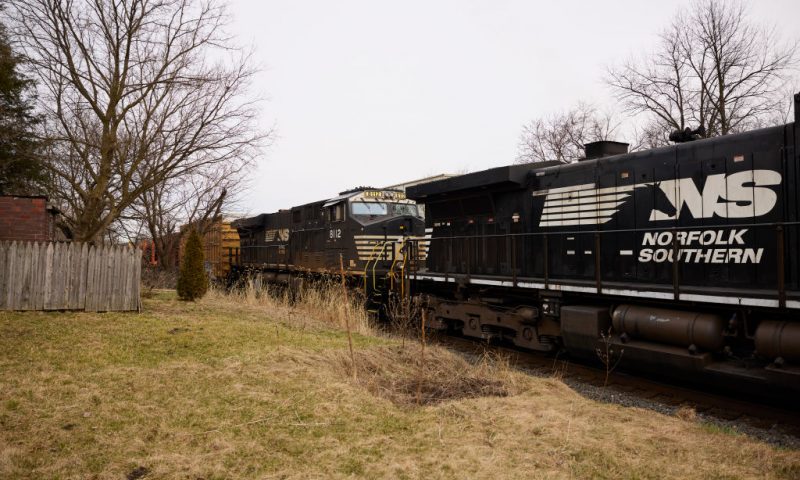A Norfolk Southern train is en route on February 14, 2023 in East Palestine, Ohio. Another train operated by the company derailed on February 3, releasing toxic fumes and forcing evacuation of residents. (Photo by Angelo Merendino/Getty Images)