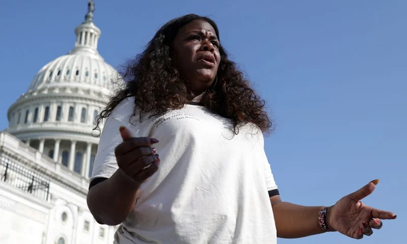 Cori Bush (D-MO) speaks to a reporter outside the U.S. Capitol August 2, 2021 in Washington, DC. Photo by Alex Wong/Getty Images)