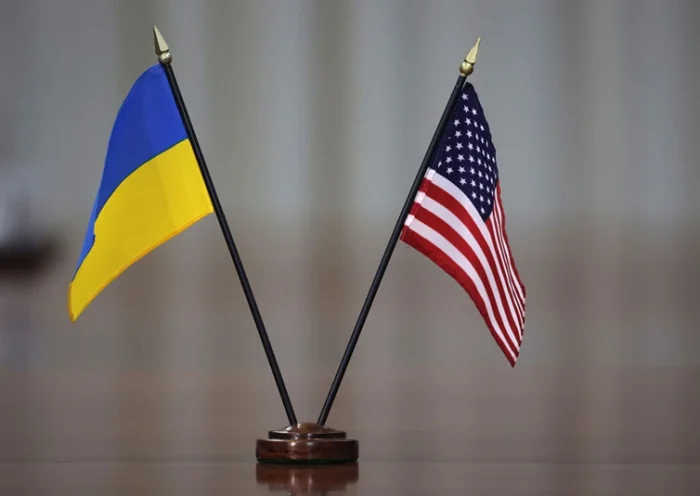 A flag of the United States is placed with a flag of Ukraine on the conference table during a bilateral meeting between U.S. Secretary of Defense Lloyd Austin and Foreign Minister Dmytro Kuleba of Ukraine at the Pentagon on February 22, 2022 in Arlington, Virginia. (Photo by Alex Wong/Getty Images)