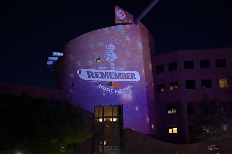 The logo for the Remember Music Festival is projected on the side of the building during the Remember Music Festival, held on the fifth anniversary of the deadliest mass shooting in modern U.S. history, at the Clark County Government Center Amphitheater on October 01, 2022 in Las Vegas, Nevada. Proceeds from the event will benefit the efforts to create a permanent memorial recognizing 1 October to honor survivors and victims of the shooting at the Route 91 Harvest music festival on the Las Vegas Strip in 2017. (Photo by David Becker/Getty Images)