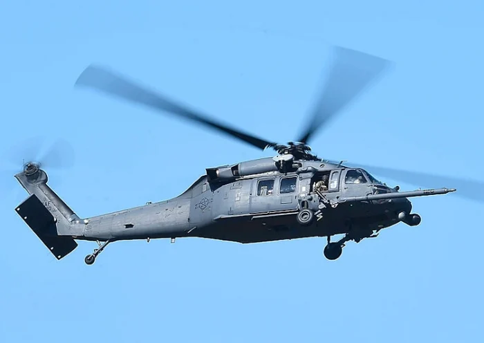 A U.S military HH-60 Pave Hawk Helicopter is seen flying over a simulated crash site during Exercise Angel Reign on July 1, 2016 in Townsville, Australia. Exercise Angel Reign is the largest Air Force led field exercise in Australia this year and is a bilateral Joint Personnel Recovery exercise which aims to practice search and rescue activities both at sea and on land. (Photo by Ian Hitchcock/Getty Images)