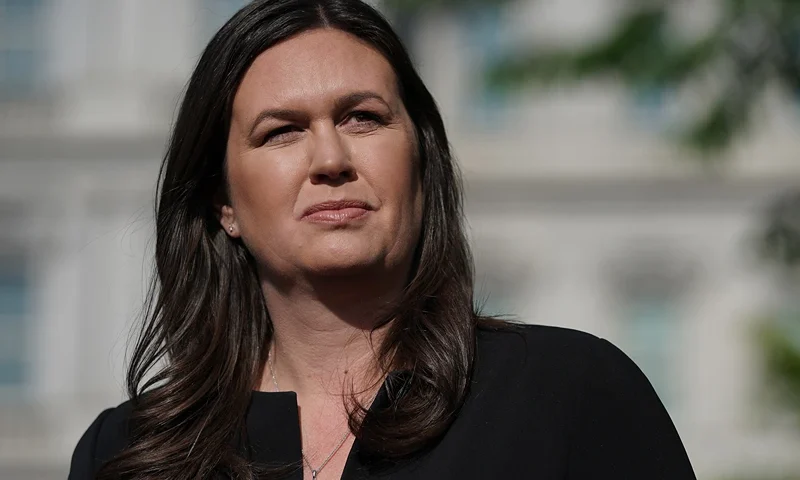 WASHINGTON, DC - APRIL 29: White House Press Secretary Sarah Huckabee Sanders talks to reporters after being interviewed outside the White House April 29, 2019 in Washington, DC. In lieu of regular press briefings inside the White House, Sanders now regularly stops to talk to reporters after being interviewed by FOX and Friends. (Photo by Chip Somodevilla/Getty Images)
