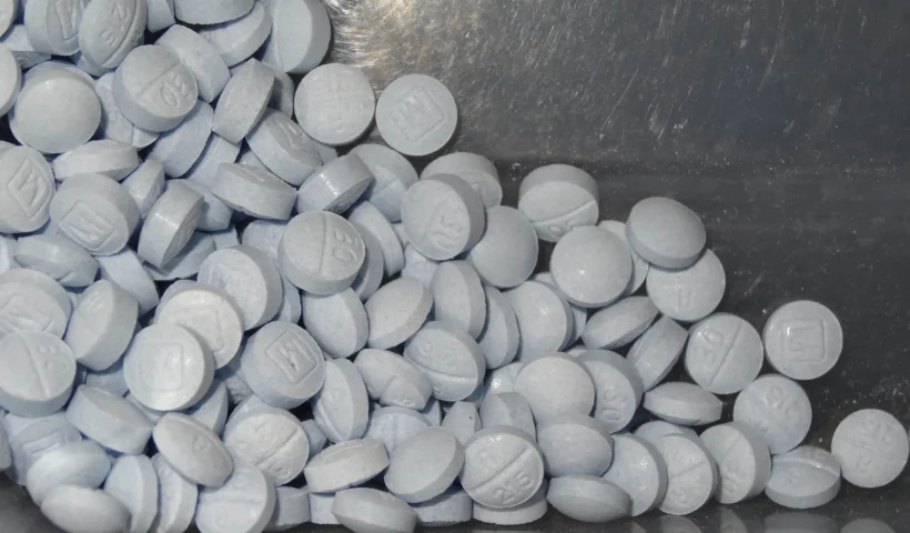FILE - This undated file photo provided by the U.S. Attorneys Office for Utah shows fentanyl-laced fake oxycodone pills collected during an investigation. (U.S. Attorneys Office for Utah via AP, File)