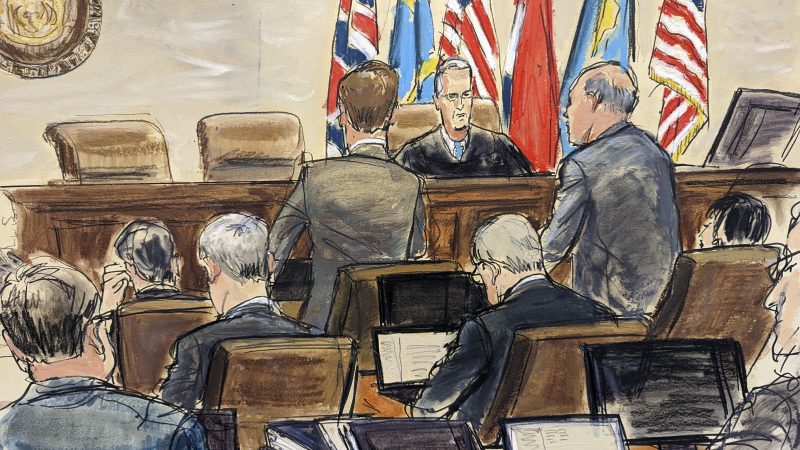This artist sketch depicts Dominion Voting Systems attorney Justin Nelson, standing left, and Fox News attorney Daniel Webb, standing at right, speaking to Judge Eric Davis before finishing jury selection in Delaware Superior Court Tuesday, April 18, 2023, in Wilmington, Del. (Elizabeth Williams via AP)
