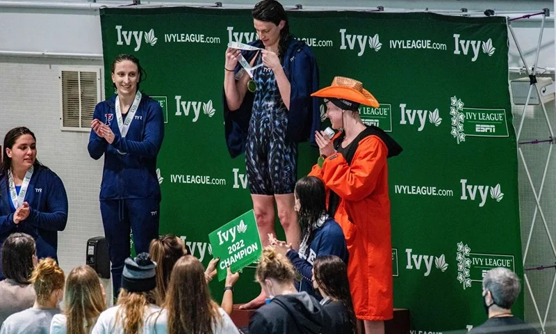 Penn Universitys transgender swimmer Lia Thomas holds her medal during a award presentation after taking first place in the 500 yard freestyle race with a time of 4.37.32 during the championship final race in heat three during the Women's Ivy League Swimming & Diving Championships at Harvard University in Cambridge, Massachusetts on February 17, 2022. (Photo by Joseph Prezioso / AFP) (Photo by JOSEPH PREZIOSO/AFP via Getty Images)
