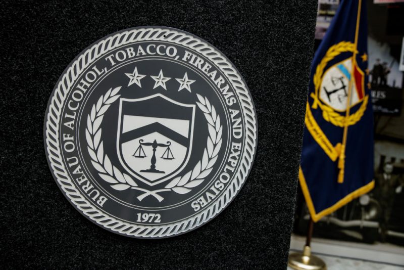 The Bureau of Alcohol, Tobacco, Firearms, and Explosives (ATF) is seen on the podium before the ceremonial swearing-in of Steven Dettelbach as the second ATF Director to be confirmed by Congress at the ATF headquarters on July 19, 2022 in Washington, DC. (Photo by Samuel Corum/Getty Images)