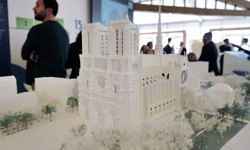 This photograph taken on March 14, 2023, shows a model of the Notre Dame de Paris Cathedral during the MIPIM international real estate event for professionals at the Palais des Festivals in Cannes, southeastern France. (Photo by Valery HACHE / AFP) (Photo by VALERY HACHE/AFP via Getty Images)