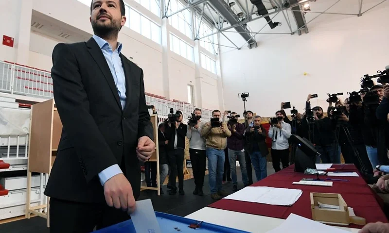 Montenegro's presidential candidate Jakov Milatovic casts his ballot at the polling station to vote in the second round of the presidential election in Podgorica, on April 2, 2023. - Montenegrins cast ballots on Sunday, for a final presidential contest, pitting the Adriatic nation's longest serving leader, Milo Djukanovic against Jakov Milatovic, a relative newcomer on country's political scene. (Photo by SAVO PRELEVIC / AFP) (Photo by SAVO PRELEVIC/AFP via Getty Images)