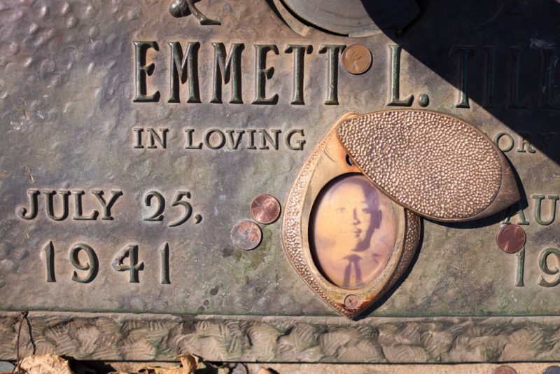 A faded photograph is attached to the  headstone that marks the gravesite of Emmett Till in Burr Oak Cemetery on March 22, 2021 in Chicago, Illinois. Till's brutal murder in Money, Mississippi in the summer of 1955 and his mother's decision to hold an open-casket funeral to expose the brutality of the murder is credited with igniting the modern civil rights movement. The home in Chicago where Till lived with his mother recently gained Chicago landmark status and there are plans to turn the home into a museum and the church where his funeral was held is being considered for designation as a National Monument.    (Photo by Scott Olson/Getty Images)