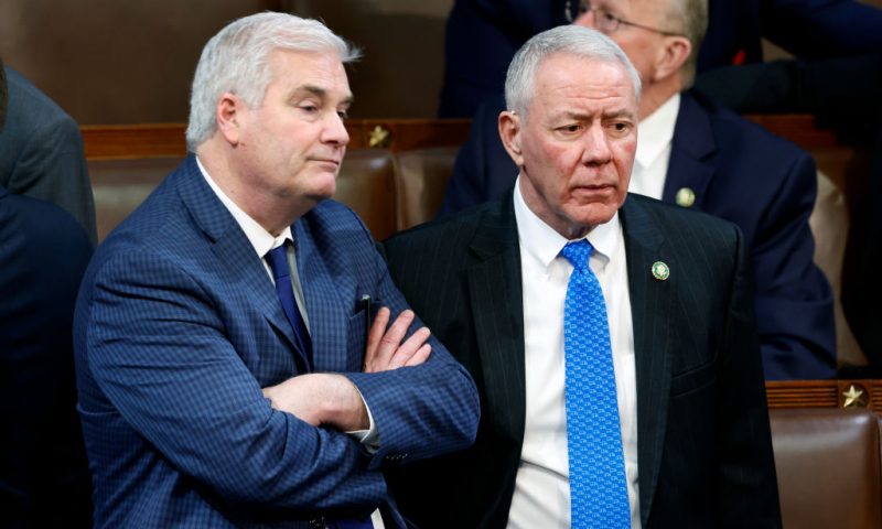 WASHINGTON, DC - JANUARY 04: U.S. Rep.-elect Tom Emmer (R-MN) (L) talks to Rep.-elect Ken Buck (R-CO) in the House Chambers on the second day of elections for Speaker of the House at the U.S. Capitol Building on January 04, 2023 in Washington, DC. The House of Representatives is meeting to vote for the next Speaker after House Republican Leader Kevin McCarthy (R-CA) failed to earn more than 218 votes on three separate Tuesday ballots, the first time in 100 years that the Speaker was not elected on the first ballot. (Photo by Anna Moneymaker/Getty Images)