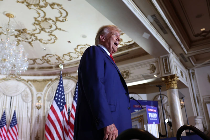Former U.S. President Donald Trump greets supporters during an event at the Mar-a-Lago Club April 4, 2023 in West Palm Beach, Florida. Trump pleaded not guilty in a Manhattan courtroom today to 34 counts related to money paid to adult film star Stormy Daniels in 2016, the first criminal charges for any former U.S. president. (Photo by Joe Raedle/Getty Images)