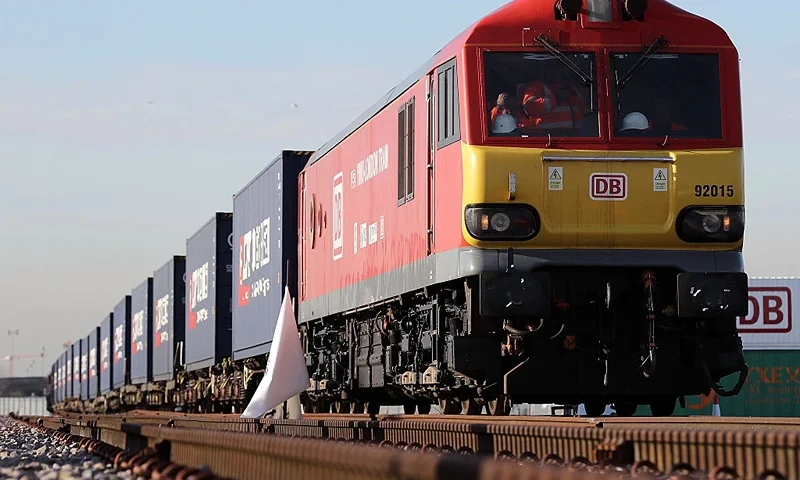 BARKING, ENGLAND - JANUARY 18: A train engine pulls carriages that started their Journey in Yiwu in China into Barking rail freight terminal on January 18, 2017 in Barking, England. After travelling for 16 days and covering around 7,456 miles passing through China, Kazakhstan, Russia, Belarus, Poland, Germany, Belgium and France, The East Wind freight train which is made up of 34 wagons is hoped will herald a 'new era of UK-China relations'. The Engine that started the journey was changed to accomodate different gauge tracks in the UK. (Photo by Dan Kitwood/Getty Images)